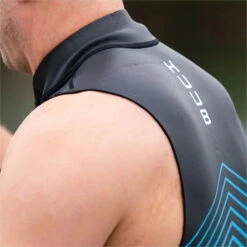 Huub Mens Aluna SUP & Swim Neoprene Top -Mystic || Rip Curl || GILL Shop 43407 202320Huub20Mens20Aluna20SUP2020Swim20Neoprene20Top20ALUNAVEST20 20Black2020Blue20Lifestyle202.700x700